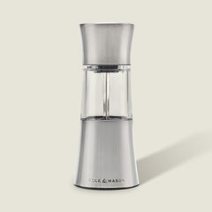 The Cole & Mason Stadhampton Chilli & Spice Mill features stainless steel and clear acrylic with an ergonomic design, COLE & MASON branding at the base, shown upright against a plain light background.