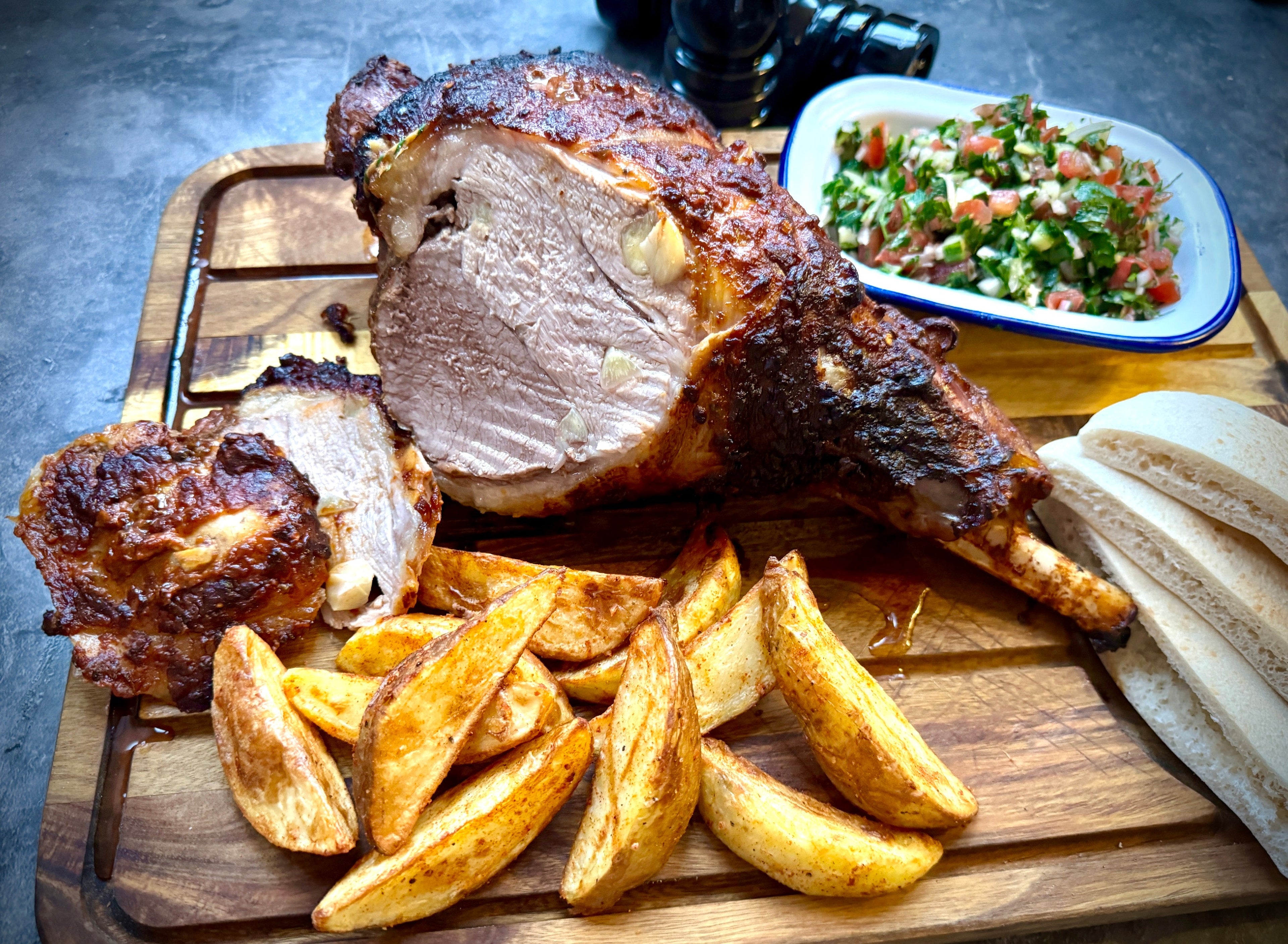 Easter Lamb with Pita Breads, Spicy Potato Wedges and Fresh Salad
