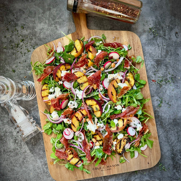 Grilled Peach, Goats Cheese and Crispy air fried Proscuitto Salad with a Honey, Mustard and Chilli dressing