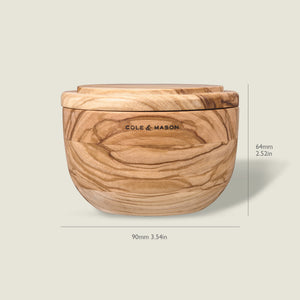 The Cole & Mason Portobello Olive Wood Salt Cellar features a lid and natural swirled grain. Measuring 64mm tall and 90mm wide, this round container adds charm to any kitchen decor.
