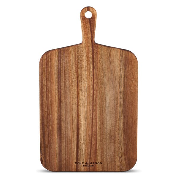 Natural shaped cutting board with handle and a hole for hanging