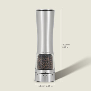 The Cole & Mason Electric Derwent Pepper Mill features a tall, silver design with a transparent lower section filled with peppercorns, measuring 7.56 in (192 mm) high and 2.36 in (60 mm) wide.